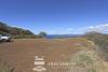 Flat building pad with stunning panoramic ocean view